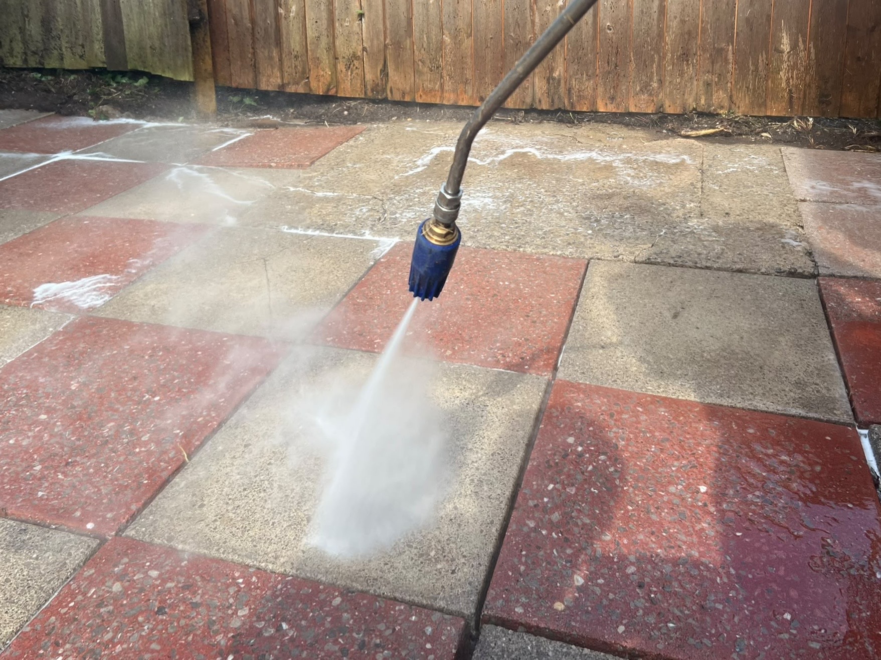 Pressure washer lance in use