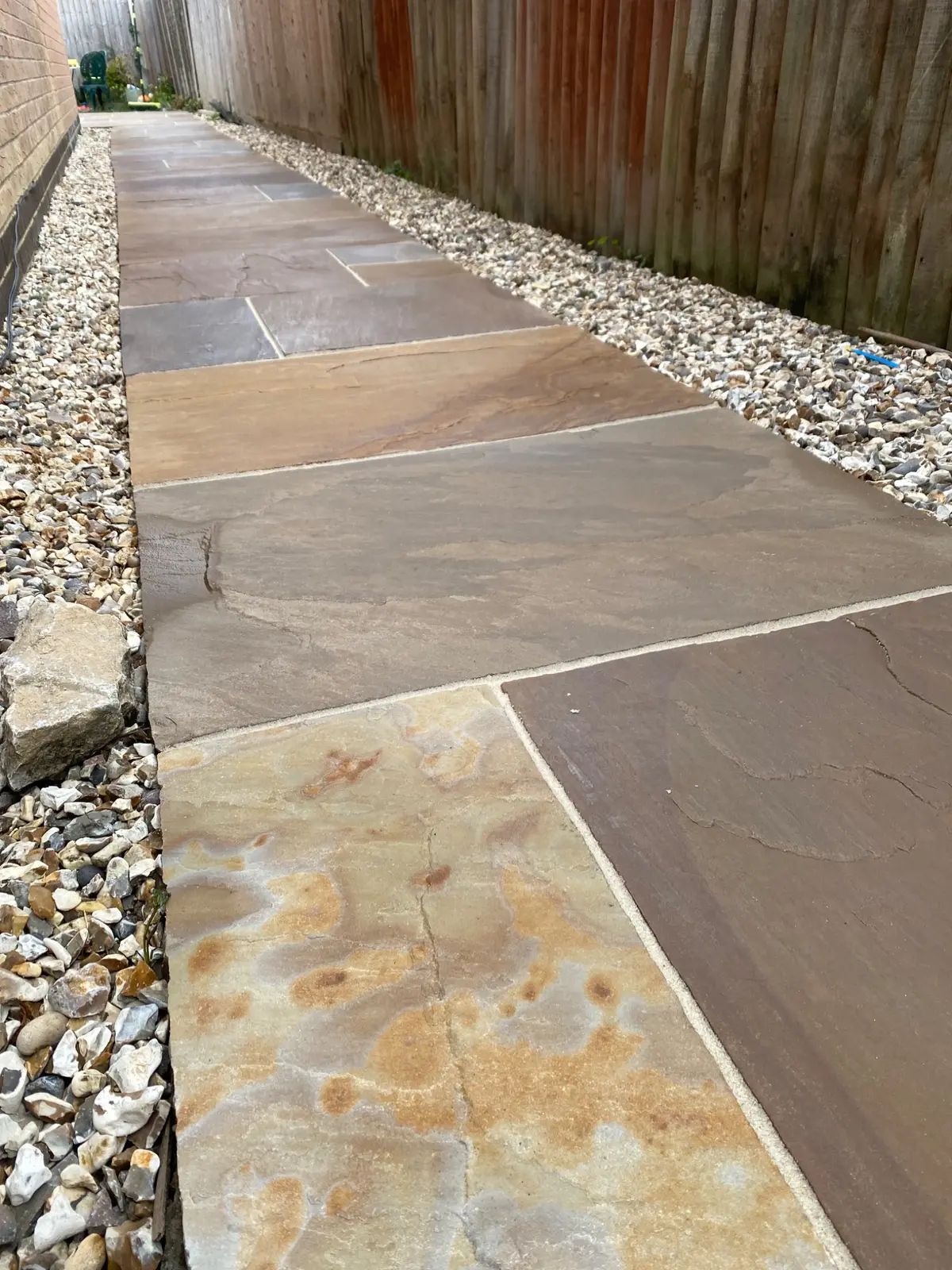 Clean Indian sandstone garden pathway
