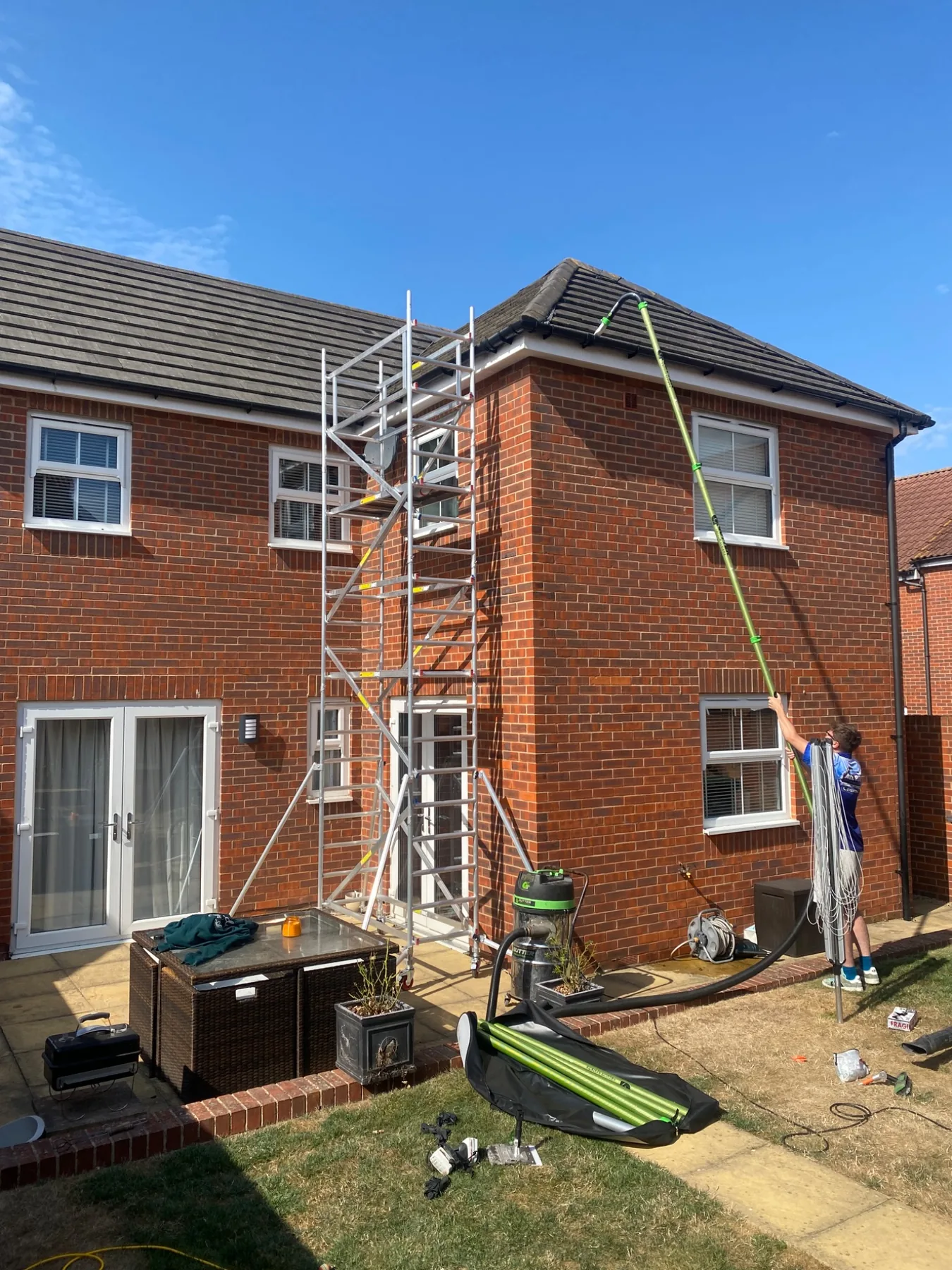 Professional roof cleaning and gutter clearance work
