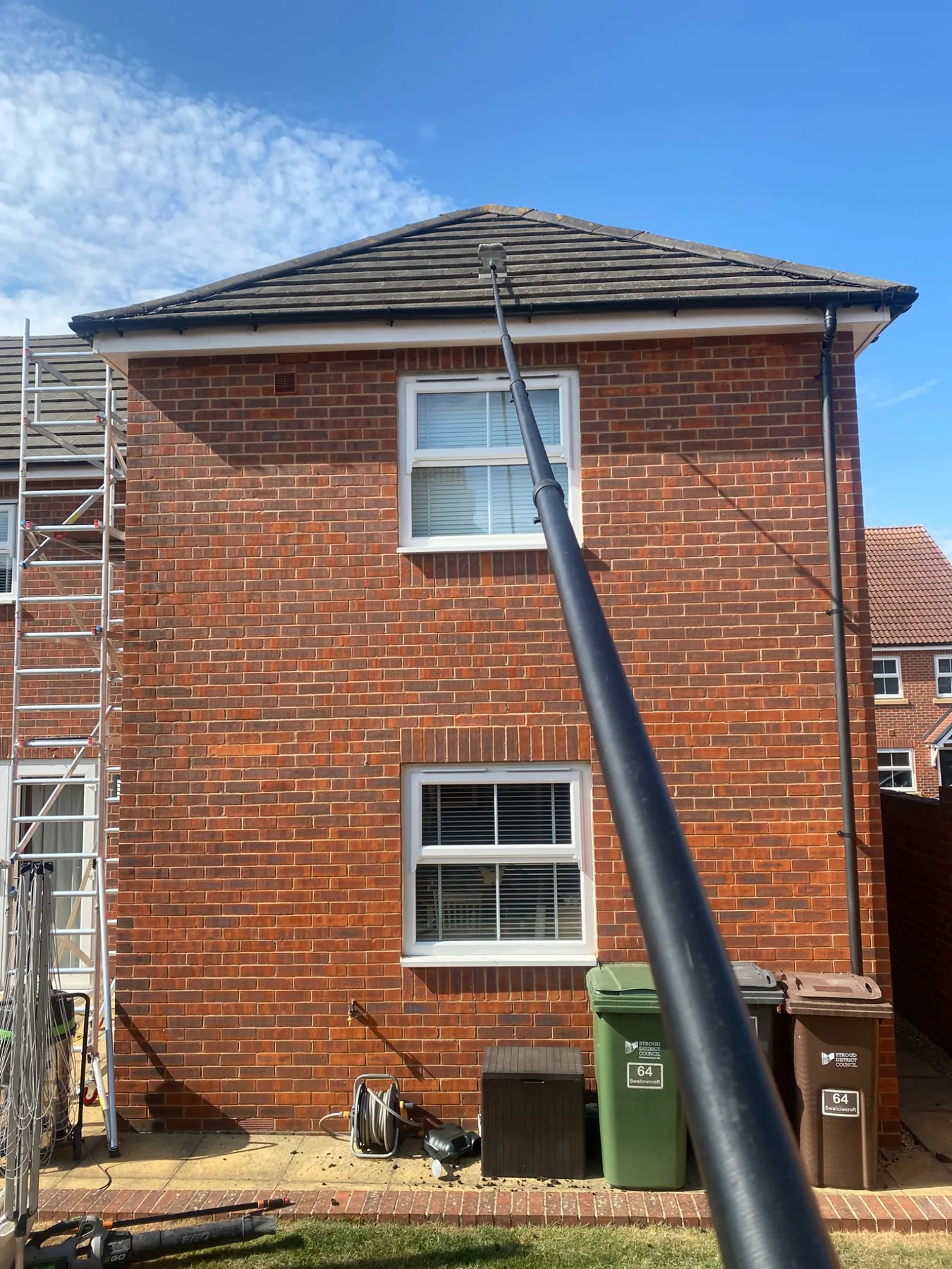 Professional roof cleaning and gutter clearance work