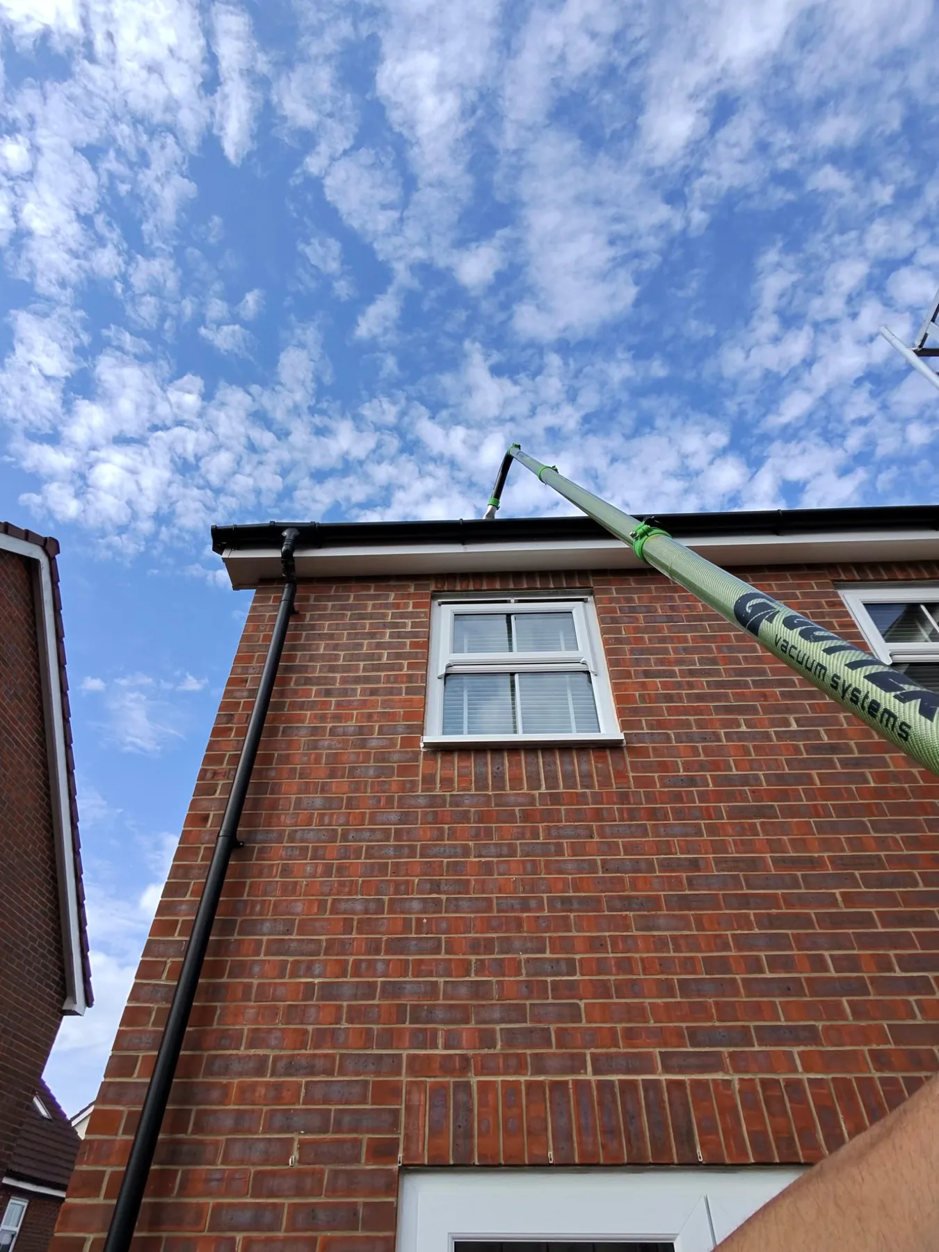 Professional roof cleaning and gutter clearance work
